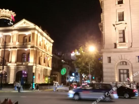 Old bungalow with view of Shanghai Bund