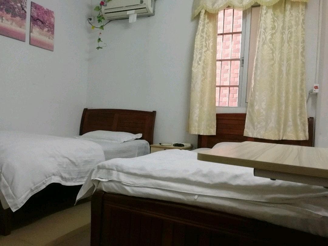 Guangzhou Baicheng University Town Yijia Apartment