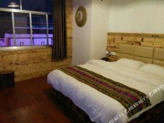 Meili Tujia Art Hotel