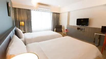 Grand Tower Inn Sathorn Hotel