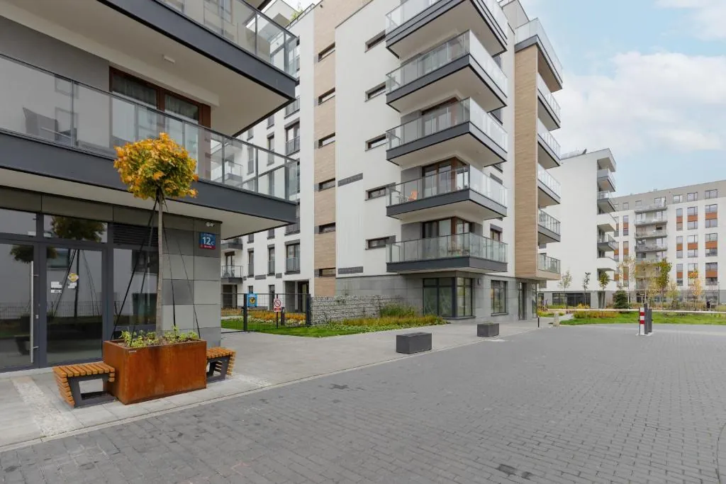 Warsaw Apartment Postepu with Parking by Noclegi Renters