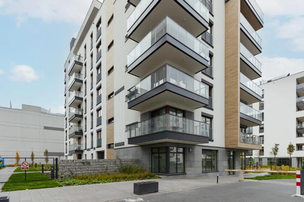 Warsaw Apartment Postepu with Parking by Noclegi Renters