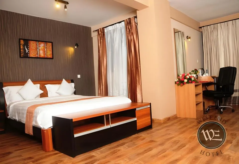 WE Hotel and Suites