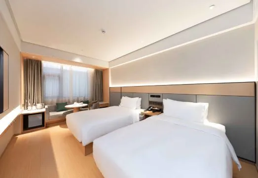 QJ Shanghai dongminglu road subway station hotel