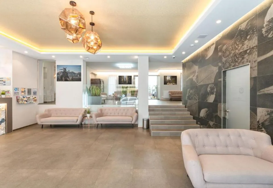 Corvin Plaza Apartments & Suites