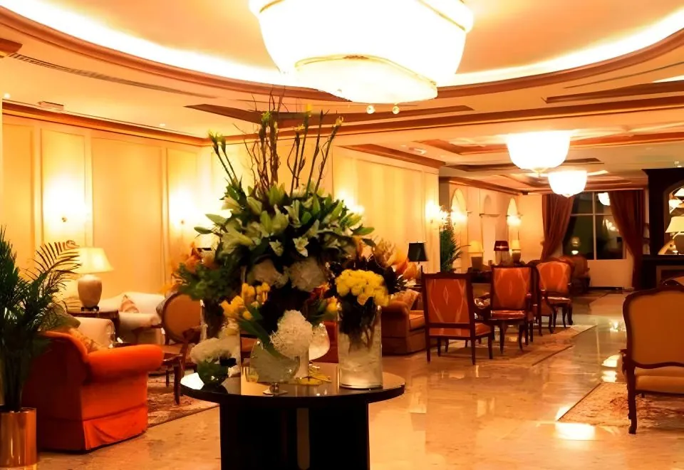Magnum Hotel & Suites West Bay