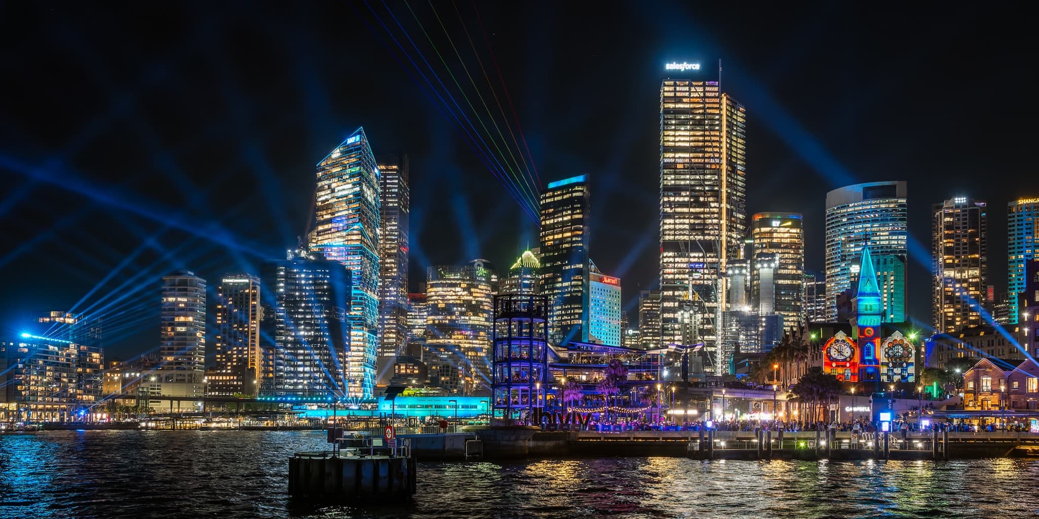 Sydney harbor and skyline transformed by light installations and laser projections during Vivid Sydney