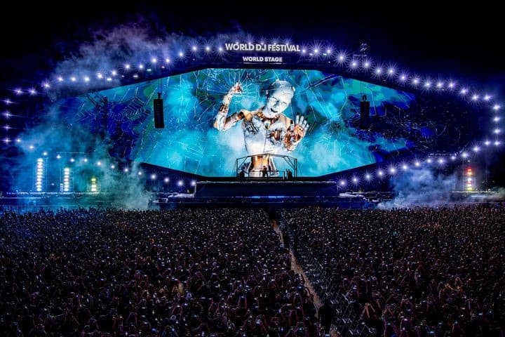 Main stage of World DJ Festival in Seoul with massive lights and crowd at Seoul Land amusement park