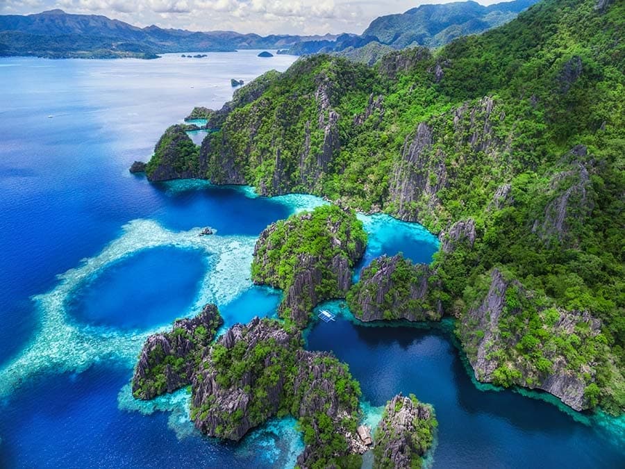 Aerial view of Coron's twin lagoons, with limestone karst islands and turquoise water in Palawan, Philippines