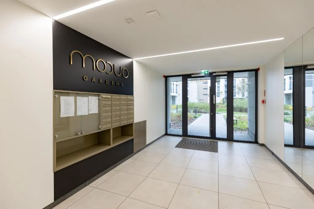 Warsaw Apartment Postepu with Parking by Noclegi Renters